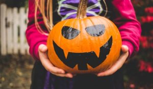Halloween 2018: Child with pumpkin